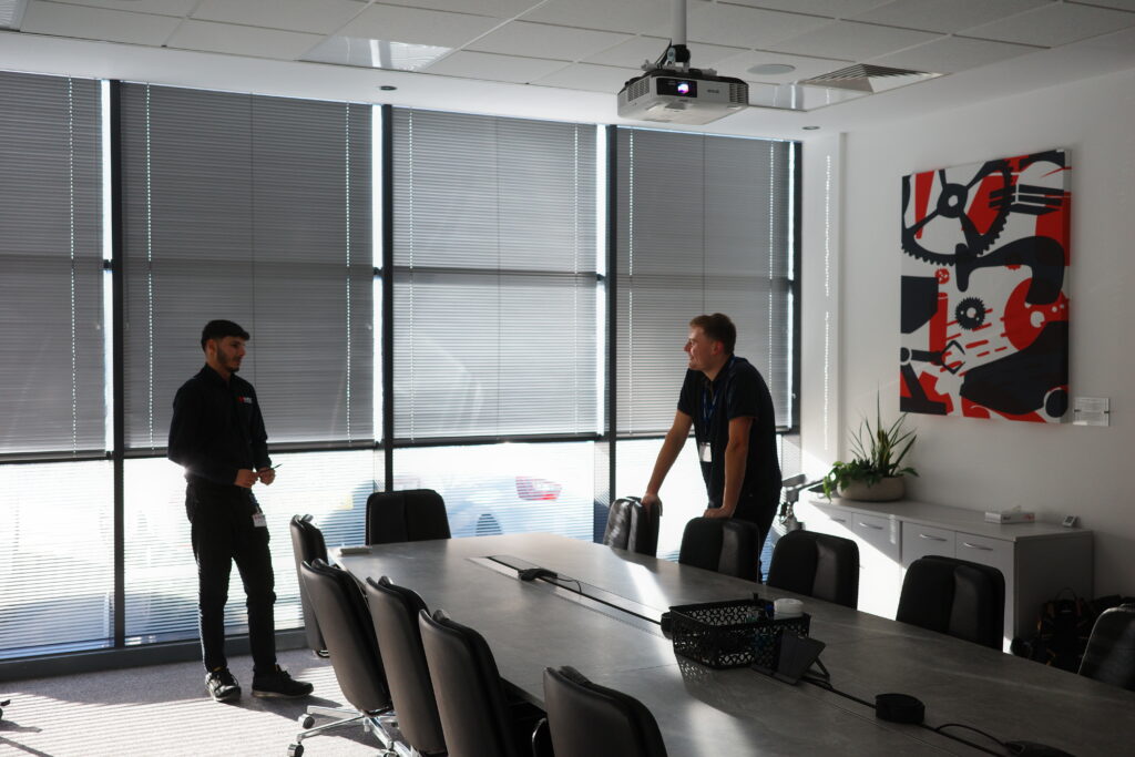 A training room with an interactive digital display, optimised for business presentations and employee development.