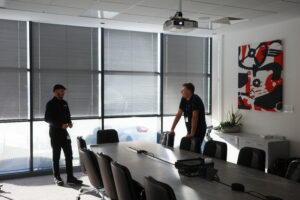 A training room with an interactive digital display, optimised for business presentations and employee development.